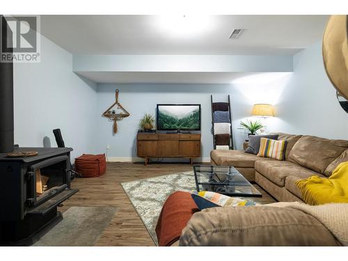 5587 Highway 6, Coldstream, BC - Indoor Photo Showing Living Room With Fireplace