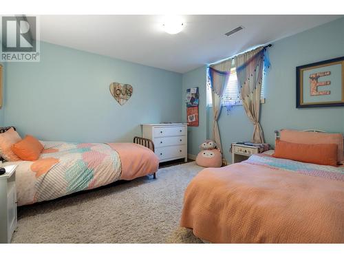 5587 Highway 6, Coldstream, BC - Indoor Photo Showing Bedroom