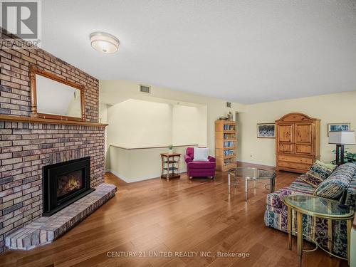 502 - 1818 Cherryhill Road, Peterborough (Monaghan), ON - Indoor Photo Showing Living Room With Fireplace