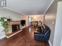 Upper - 390 Gibbons Street, Oshawa, ON  - Indoor Photo Showing Living Room With Fireplace 