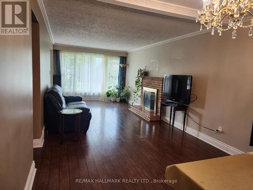 Upper - 390 Gibbons Street, Oshawa, ON - Indoor Photo Showing Living Room With Fireplace