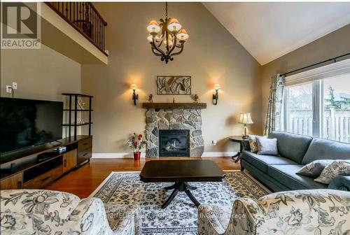 8897 Joseph Court, Niagara Falls, ON - Indoor Photo Showing Living Room With Fireplace