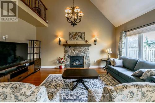 8897 Joseph Court, Niagara Falls, ON - Indoor Photo Showing Living Room With Fireplace