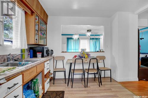 1220 Dewdney Avenue E, Regina, SK - Indoor Photo Showing Kitchen With Double Sink