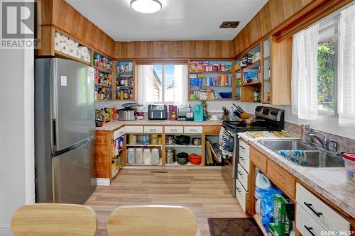 1220 Dewdney Avenue E, Regina, SK - Indoor Photo Showing Kitchen With Double Sink