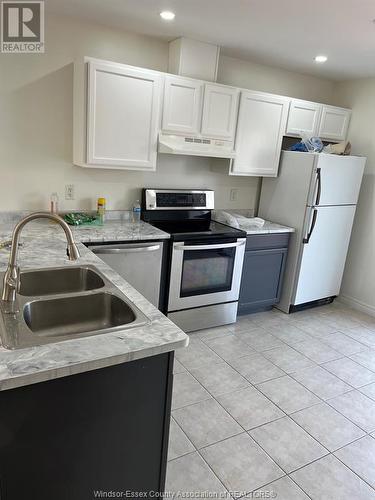 3726 Holburn, Windsor, ON - Indoor Photo Showing Kitchen With Double Sink