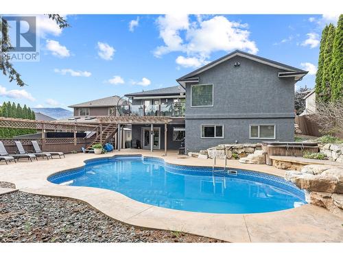 145 Magic Drive, Kelowna, BC - Outdoor With In Ground Pool With Backyard