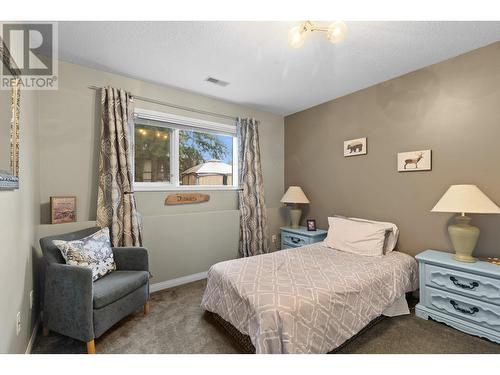 145 Magic Drive, Kelowna, BC - Indoor Photo Showing Bedroom