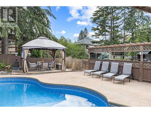 145 Magic Drive, Kelowna, BC - Outdoor With In Ground Pool With Backyard