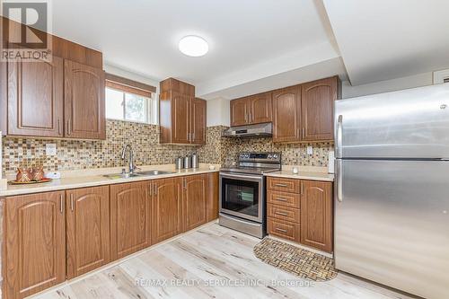 2 Poppy Hills Road, Brampton (Bram East), ON - Indoor Photo Showing Kitchen With Double Sink