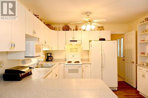 1 Reynolds Place, Prince Edward County (Wellington), ON - Indoor Photo Showing Kitchen With Double Sink