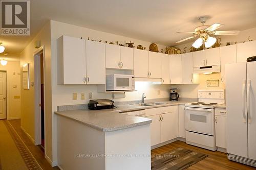 1 Reynolds Place, Prince Edward County (Wellington), ON - Indoor Photo Showing Kitchen With Double Sink