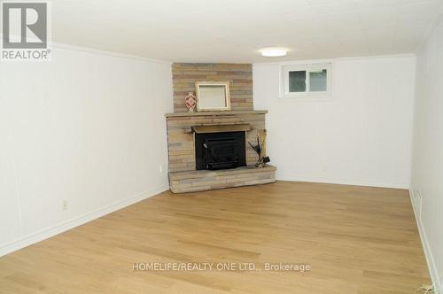 9 Ivorwood Crescent, Toronto (Wexford-Maryvale), ON - Indoor Photo Showing Living Room With Fireplace