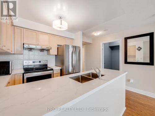 405 - 60 Brian Harrison Way, Toronto (Bendale), ON - Indoor Photo Showing Kitchen With Double Sink