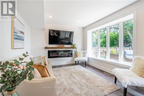 1017 Plains View Avenue, Burlington (Lasalle), ON - Indoor Photo Showing Living Room With Fireplace