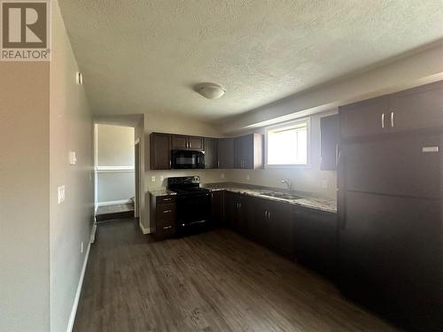 1708 82 Avenue, Dawson Creek, BC - Indoor Photo Showing Kitchen With Double Sink