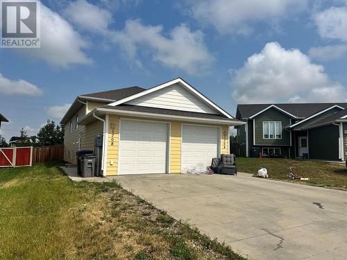 1708 82 Avenue, Dawson Creek, BC - Outdoor With Facade