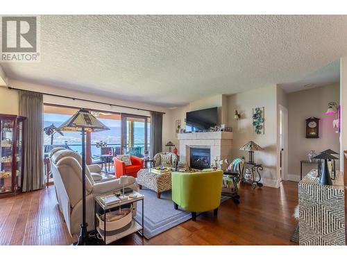 14419 Downton Avenue Unit# 211, Summerland, BC - Indoor Photo Showing Living Room With Fireplace