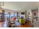 14419 Downton Avenue Unit# 211, Summerland, BC  - Indoor Photo Showing Living Room With Fireplace 