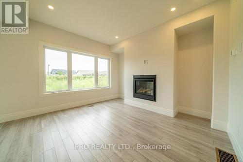 44 Campbell Crescent, Prince Edward County, ON - Indoor Photo Showing Living Room With Fireplace