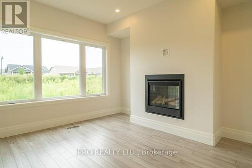 44 Campbell Crescent, Prince Edward County, ON - Indoor Photo Showing Living Room With Fireplace