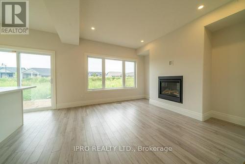 44 Campbell Crescent, Prince Edward County, ON - Indoor Photo Showing Living Room With Fireplace