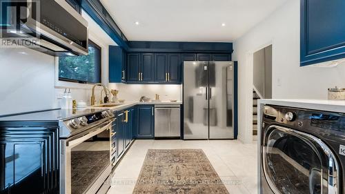 9 Delrosa Court, Toronto (Mount Olive-Silverstone-Jamestown), ON - Indoor Photo Showing Laundry Room