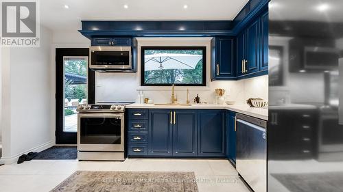 9 Delrosa Court, Toronto (Mount Olive-Silverstone-Jamestown), ON - Indoor Photo Showing Kitchen With Upgraded Kitchen