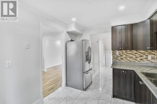 58 - 7475 Goreway Drive, Mississauga, ON - Indoor Photo Showing Kitchen With Double Sink