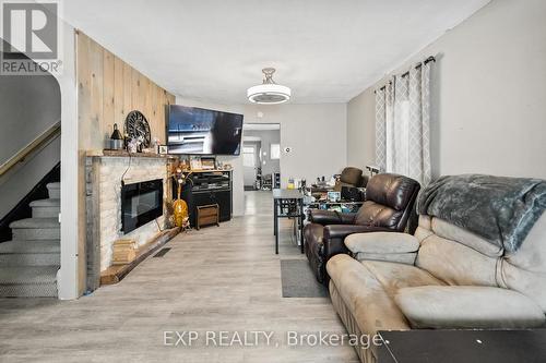 6268 Drummond Road, Niagara Falls, ON - Indoor Photo Showing Living Room With Fireplace