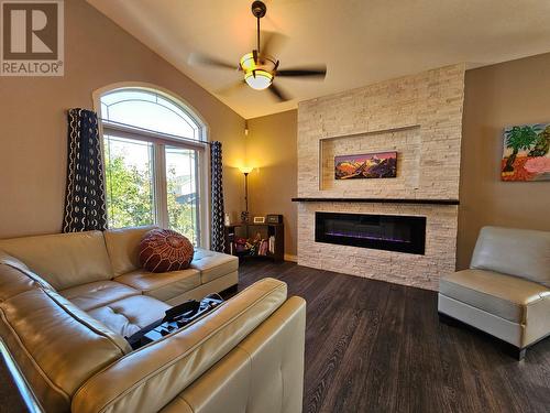 8409 18 Street, Dawson Creek, BC - Indoor Photo Showing Living Room With Fireplace