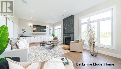 3 Hilborn Crescent, Blandford-Blenheim, ON - Indoor Photo Showing Living Room With Fireplace