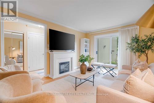 673 Woodcrest Boulevard, London, ON - Indoor Photo Showing Living Room With Fireplace