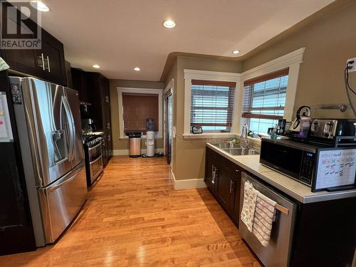 4439 Heritage Crescent, Fort Nelson, BC - Indoor Photo Showing Kitchen With Double Sink