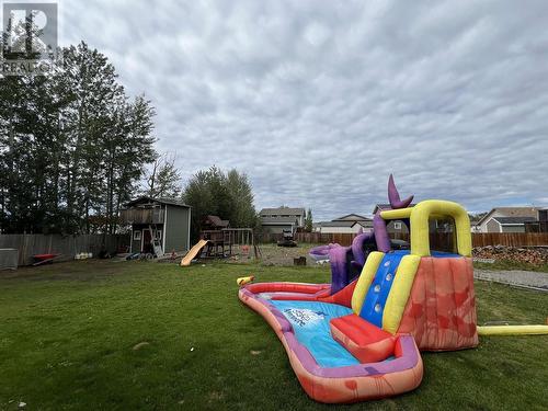 4439 Heritage Crescent, Fort Nelson, BC - Outdoor With Backyard