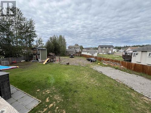 4439 Heritage Crescent, Fort Nelson, BC - Outdoor With Backyard