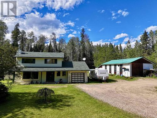 59 Pioneer Way, Fort Nelson, BC - Outdoor With Facade