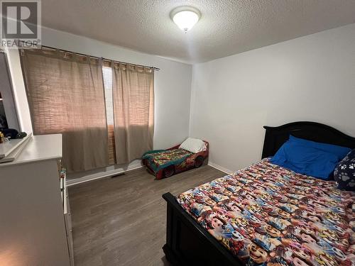 59 Pioneer Way, Fort Nelson, BC - Indoor Photo Showing Bedroom