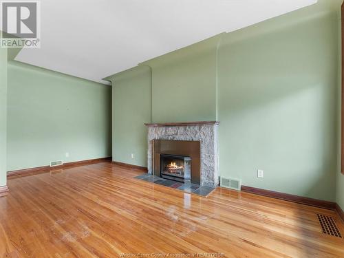 4078 Casgrain Drive, Windsor, ON - Indoor Photo Showing Living Room With Fireplace