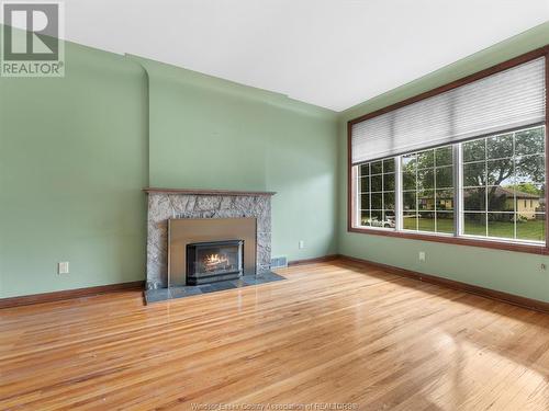 4078 Casgrain Drive, Windsor, ON - Indoor Photo Showing Living Room With Fireplace