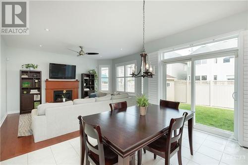 3336 Riverset Crescent, Ottawa, ON - Indoor Photo Showing Dining Room With Fireplace