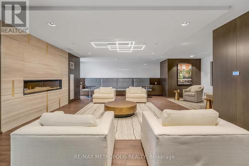 2516 - 9000 Jane Street, Vaughan (Vellore Village), ON - Indoor Photo Showing Living Room With Fireplace