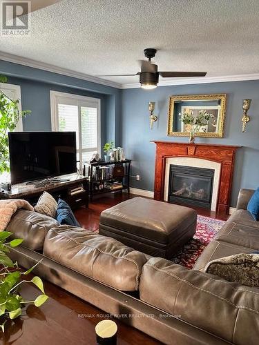 78 Bonathon Crescent, Clarington (Bowmanville), ON - Indoor Photo Showing Living Room With Fireplace