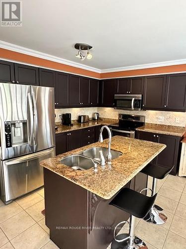 78 Bonathon Crescent, Clarington (Bowmanville), ON - Indoor Photo Showing Kitchen With Double Sink