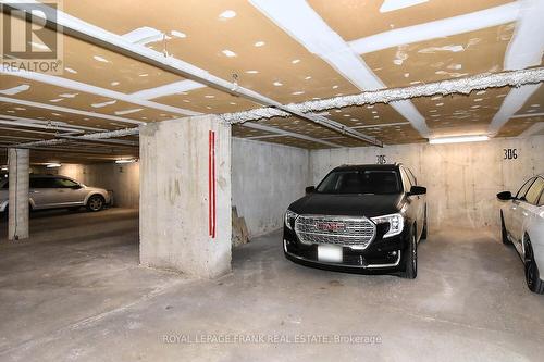 305C - 1099 Clonsilla Avenue, Peterborough (Monaghan), ON - Indoor Photo Showing Garage