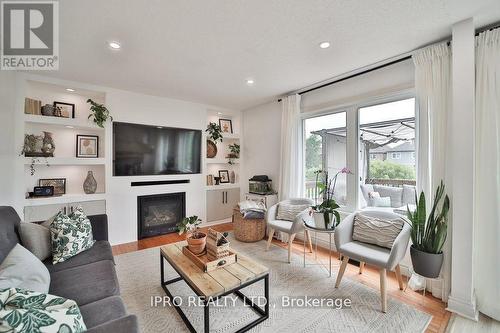 11 Earlsbridge Boulevard, Brampton, ON - Indoor Photo Showing Living Room With Fireplace