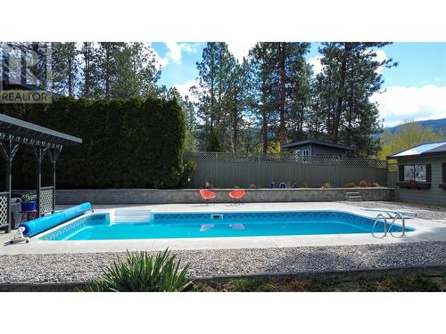 3999 Eastwood Court, Kelowna, BC - Outdoor With In Ground Pool With Backyard