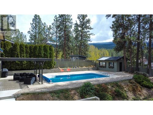 3999 Eastwood Court, Kelowna, BC - Outdoor With In Ground Pool With Backyard