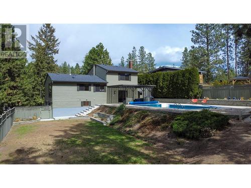 3999 Eastwood Court, Kelowna, BC - Outdoor With In Ground Pool With Backyard