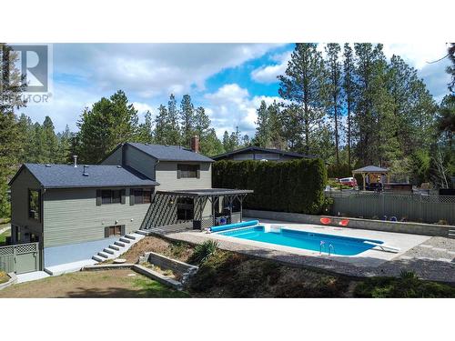 3999 Eastwood Court, Kelowna, BC - Outdoor With In Ground Pool With Backyard